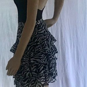 Black and white ruffles mini skirt, size 8.